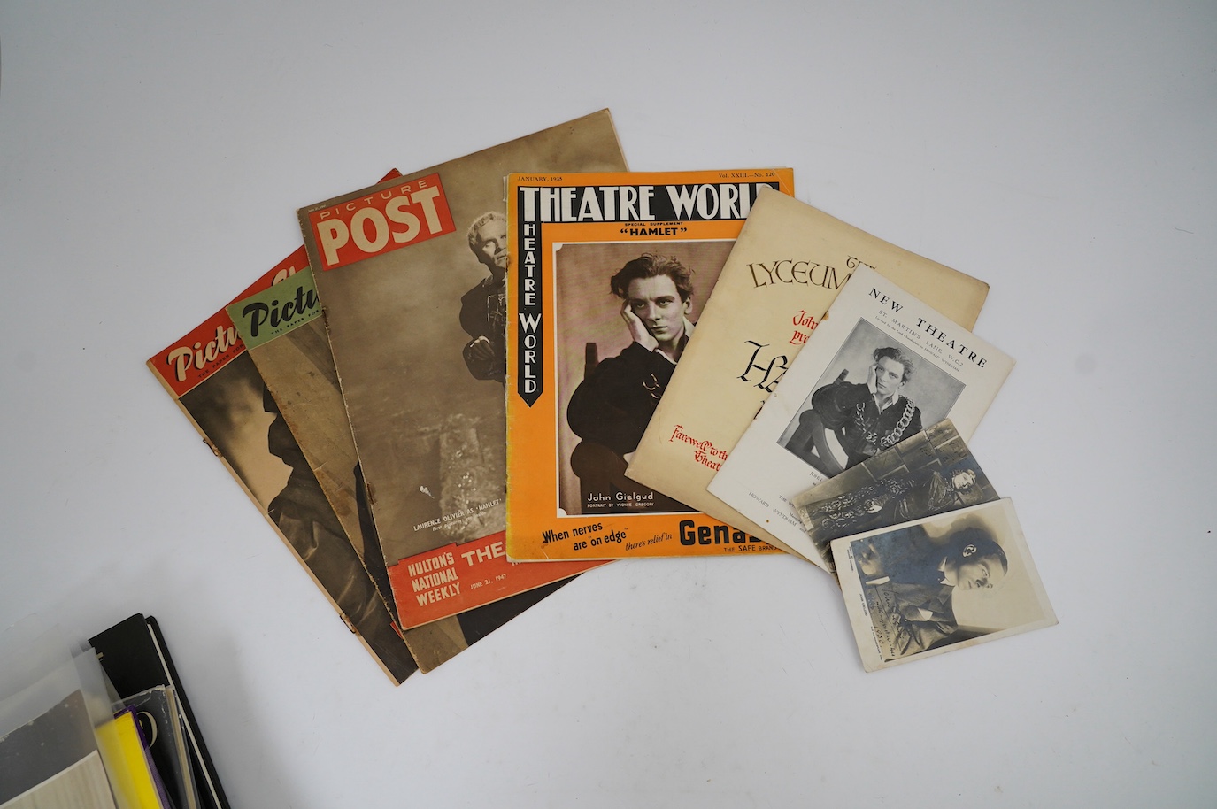 A theatrical archive of signed photos, a poster and books relating to John Gielgud and Laurence Olivier, including; a framed signed photograph of John Gielgud as Hamlet dated 1935, together with two signed photographs da